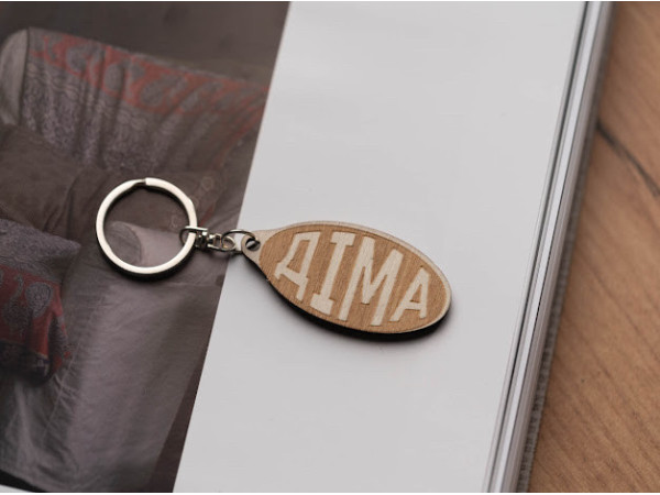 Брелок дерев'яний. ДІМА. 60х30мм
